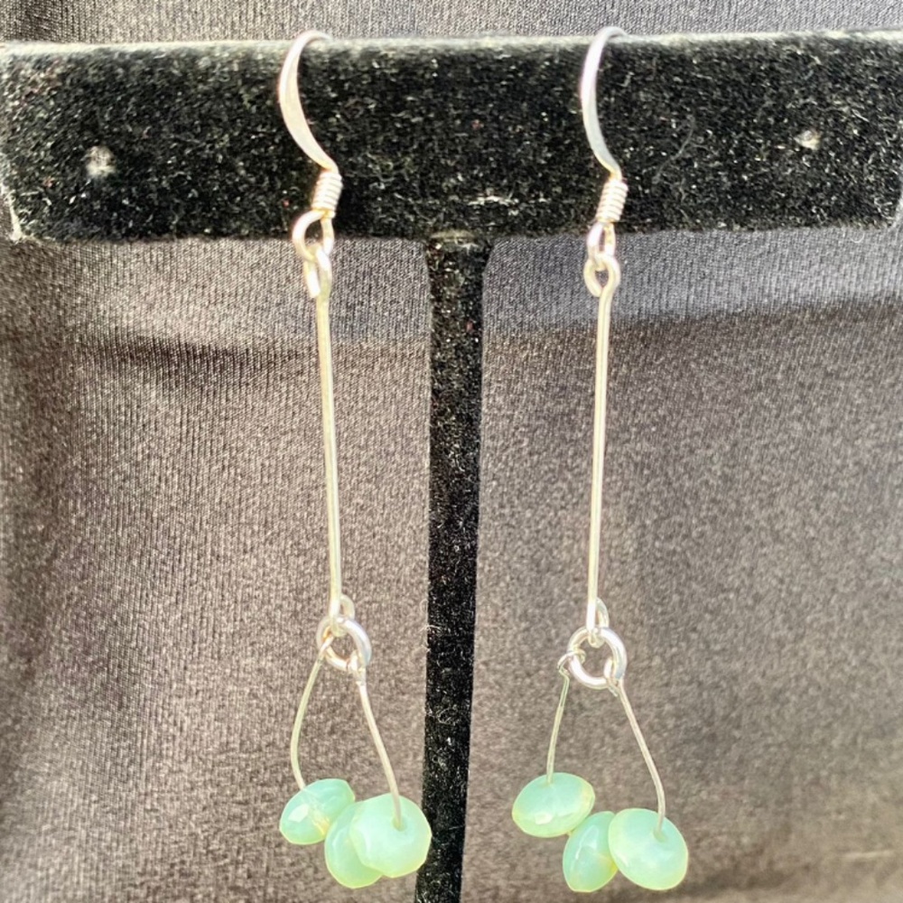 Bohemian silver earrings with green crystals